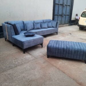 Modern L-shaped sectional sofa paired with a matching ottoman