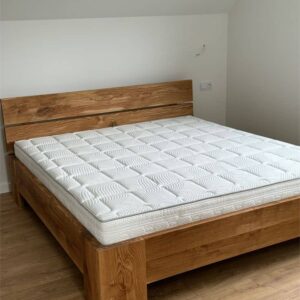 Solid wooden bed frame with a minimalist, modern design