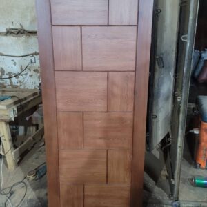 Modern solid wooden door with a geometric panel design